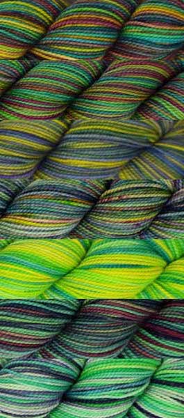 7 skeins of various hand-dyed colorways in a green base