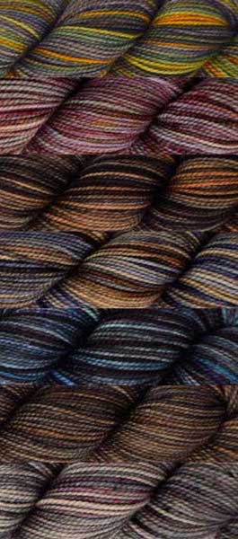 7 skeins of various hand-dyed colorways in a brown base